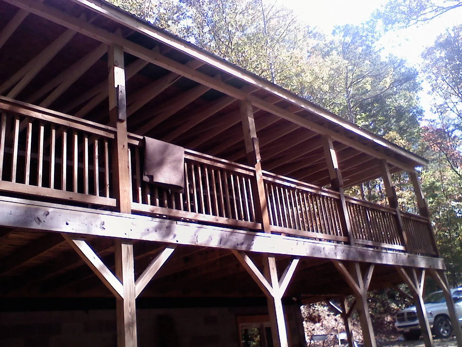 Timber framing under a new elevated porch and deck — Roof Leak Repair in Glade Park by Roofing Brothers